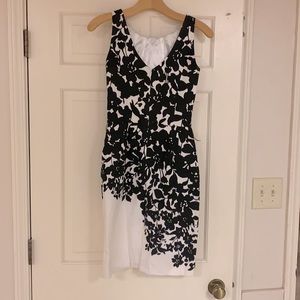 Black and white gown with ruched neckline